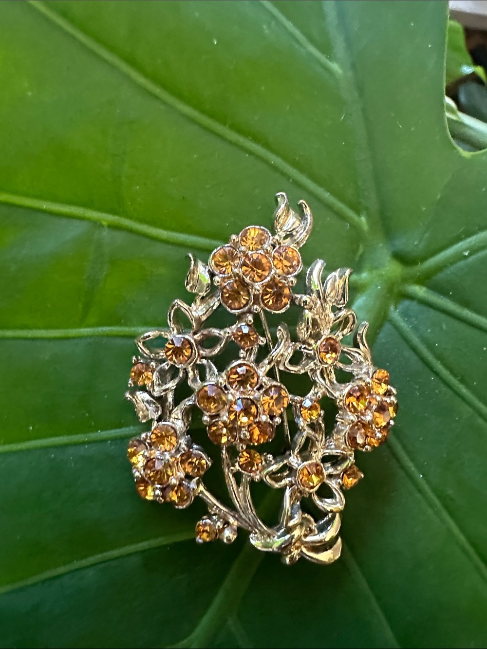 Gold-Tone Floral Cluster Brooch with Amber Crystals